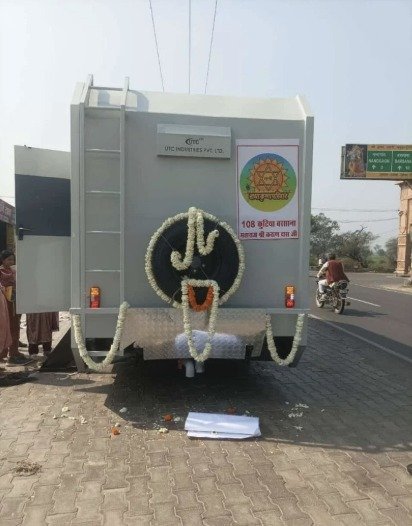 Caravan rear with ladder, spare wheel and side door