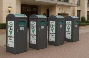 Row of solar compactors outside a hotel entrance